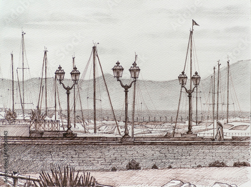 Embankment in Italy. On the pier of yachts, boats, lanterns.