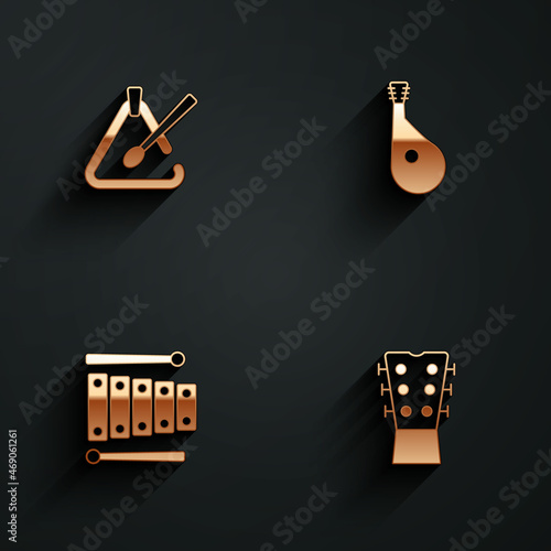 Set Triangle musical instrument, Bandura, Xylophone and Guitar neck icon with long shadow. Vector
