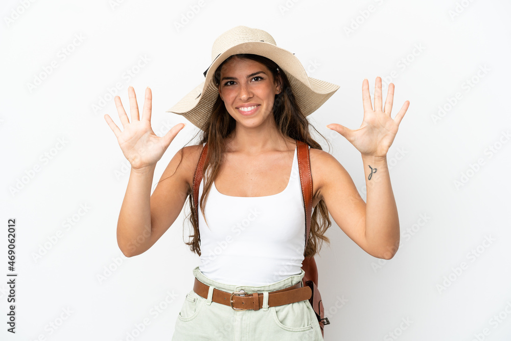 Young caucasian woman wearing a Pamela in summer holidays isolated on white background counting ten with fingers Young caucasian woman wearing a Pamela in summer holidays isolated on white background counting ten with fingers