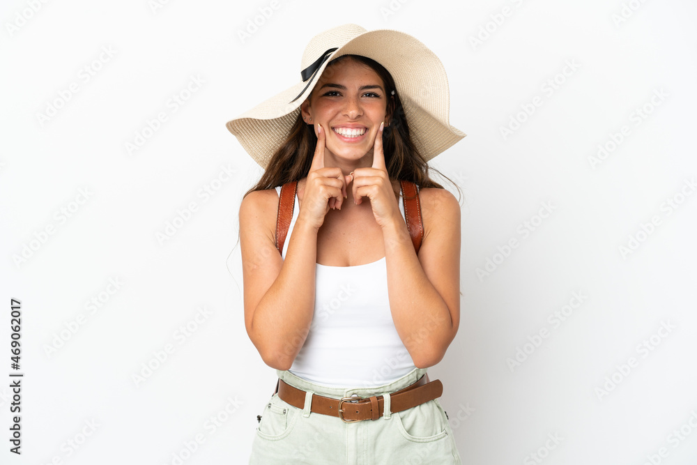 Young caucasian woman wearing a Pamela in summer holidays isolated on white background smiling with a happy and pleasant expression Young caucasian woman wearing a Pamela in summer holidays isolated on white background smiling with a happy and pleasant expression