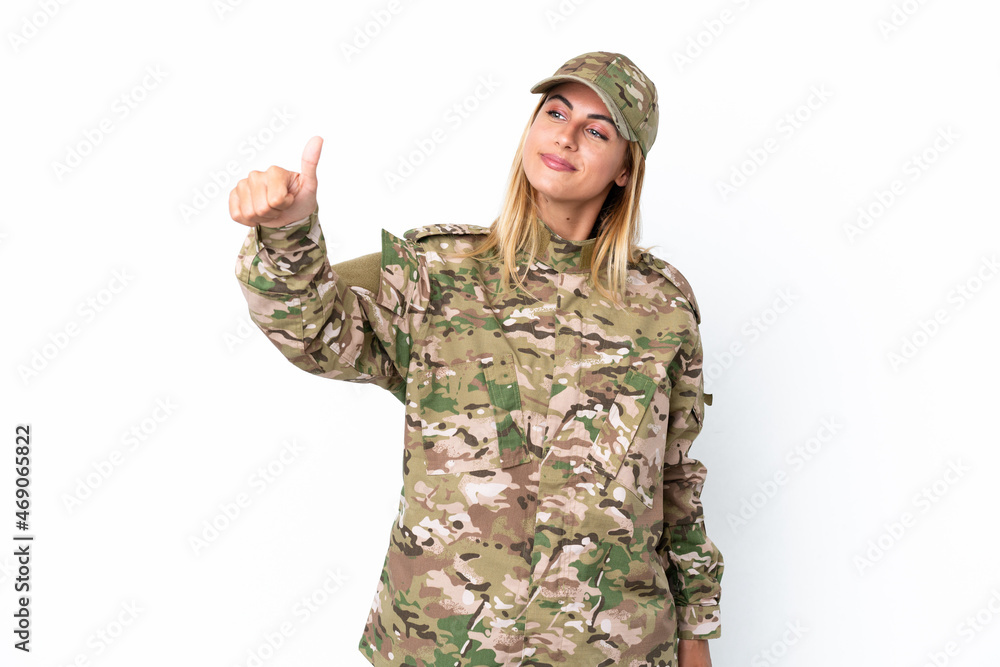 Military woman isolated on white background giving a thumbs up gesture Military woman isolated on white background giving a thumbs up gesture