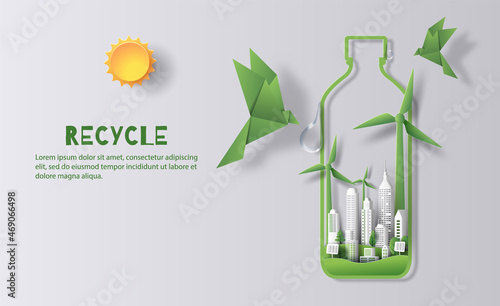 A bottle of water with a green city and a pair of paper birds, the idea is to recycle old plastic bottles, think green, paper illustration, and 3d paper.
