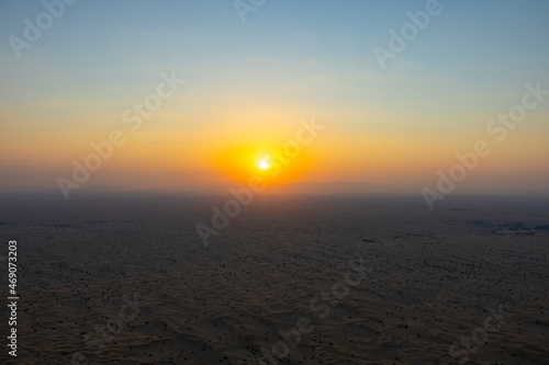 Sunrise over the Arabian Rub' al Khali Empty Quarter desert near Dubai in the United Arab Emirates © hyserb