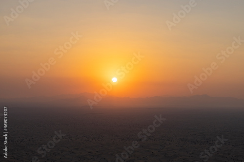 Sunrise over the Arabian Rub' al Khali Empty Quarter desert near Dubai in the United Arab Emirates