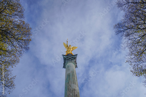 Wallpaper Mural Golden statue with trees and clouds in the background | Friedensengel, Munich, Germany Torontodigital.ca
