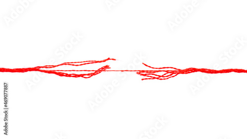 Fotografija Long red thread on the verge of breaking, isolated on white background