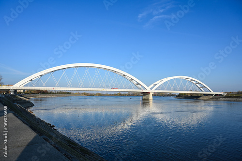 Bridge on the river Danube in Novi Sad. Architecture. Modern white metal railway bridge. Steel bridge over the river.