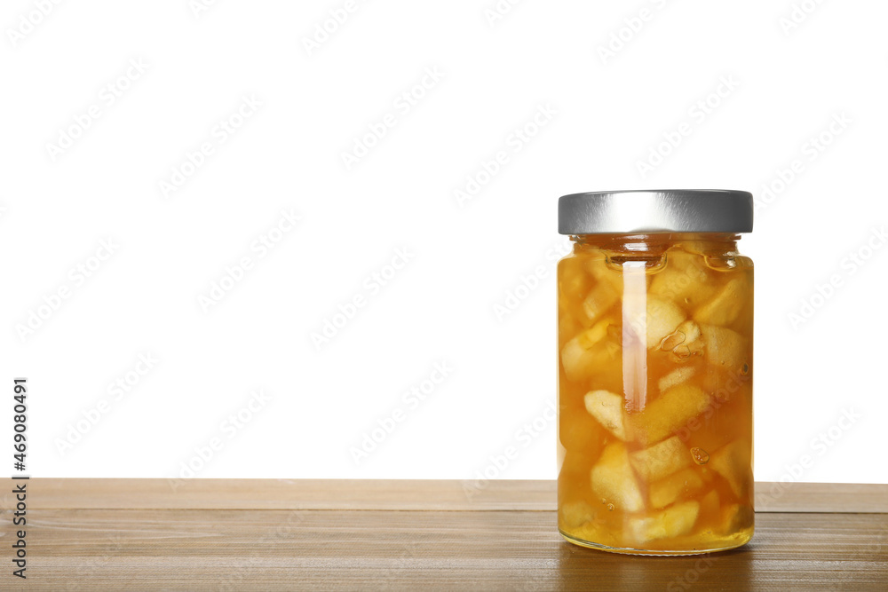 Glass jar with apple jam on wooden table against white background, space for text Glass jar with apple jam on wooden table against white background, space for text