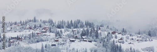 фотографія Winter mountain village landscape with snow and cute little houses, beautiful na