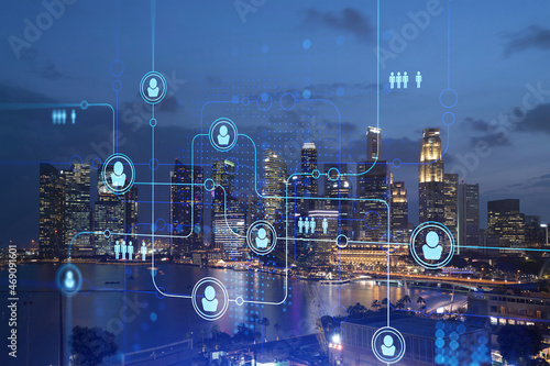 Photography Glowing Social media icons on night panoramic city view of Singapore, Asia