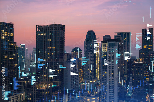 Market behavior graph hologram, sunset panoramic city view of Bangkok, popular location to achieve financial degree in Southeast Asia. The concept of financial data analysis. Double exposure.
