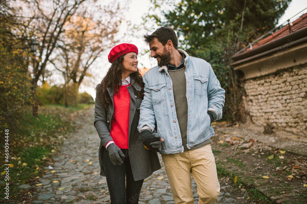 The cheerful young couple is looking forward to the holidays to come. The concept of Christmas euphoria The cheerful young couple is looking forward to the holidays to come. The concept of Christmas euphoria