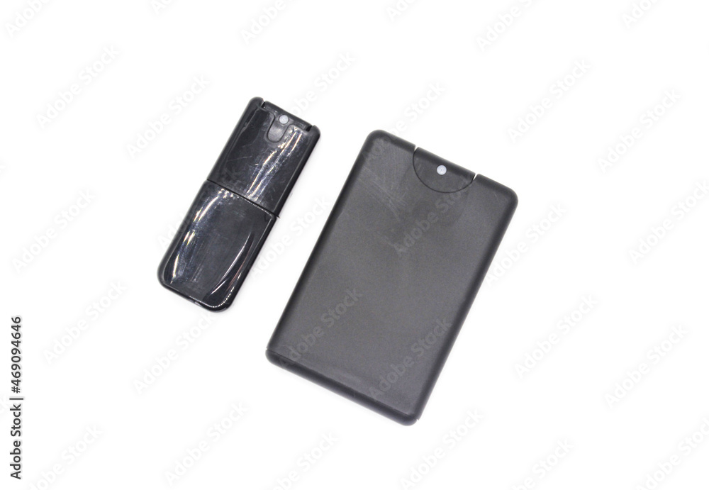 Pocket perfume on white background with selective focus Pocket perfume on white background with selective focus