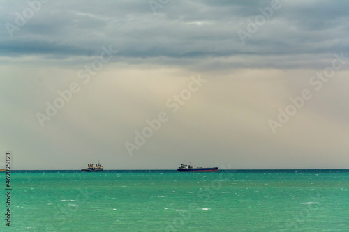 view from two cargo ships out of the international Port in chabahar, iran photo