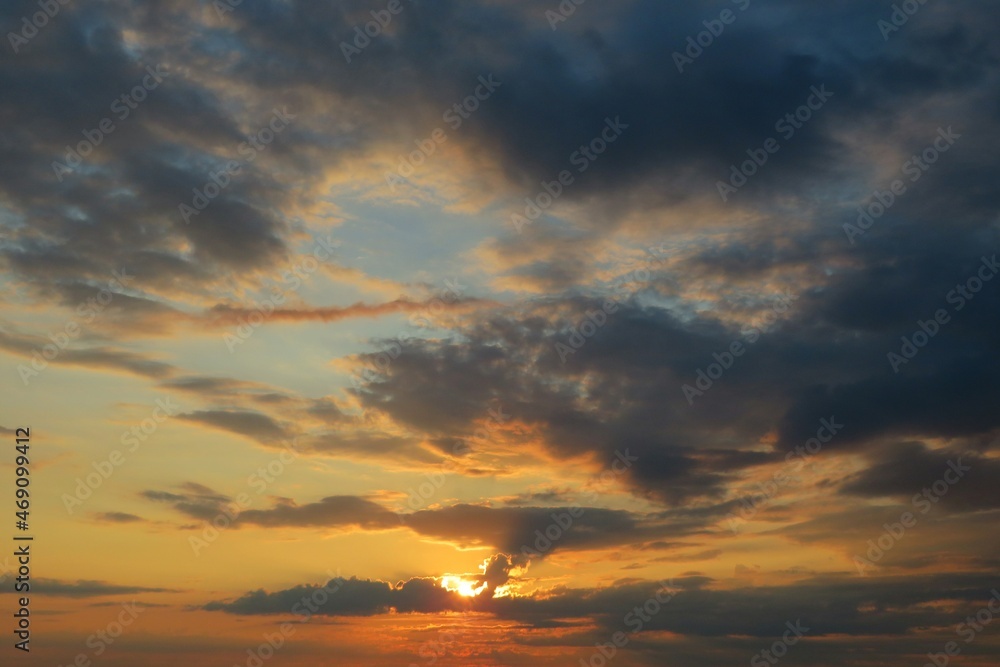 Beautiful dark dramatic sunset in the sky, natural background 