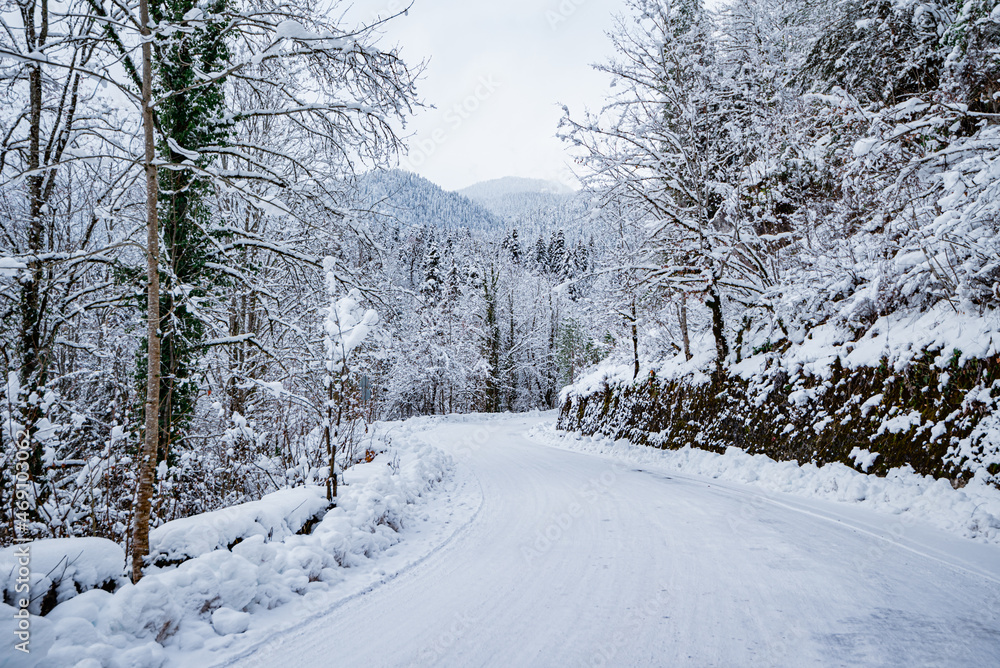 Mountain Road Winter Landscape Snow Path Automobile road.