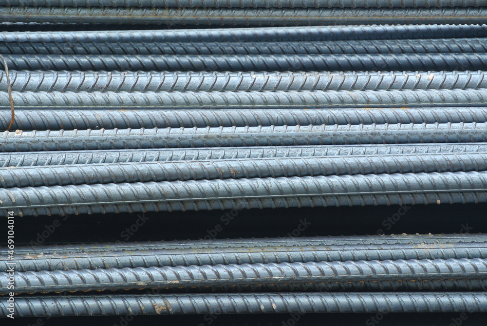 SELANGOR, MALAYSIA -MAY 13, 2016: Hot rolled deformed steel bars or steel reinforcement bars used at the construction site to strengthen concrete. It is shaped to follow the engineer's design. SELANGOR, MALAYSIA -MAY 13, 2016: Hot rolled deformed steel bars or steel reinforcement bars used at the construction site to strengthen concrete. It is shaped to follow the engineer's design.