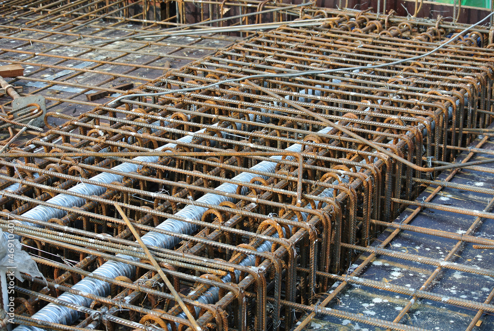 SELANGOR, MALAYSIA -MAY 13, 2016: Hot rolled deformed steel bars or steel reinforcement bars used at the construction site to strengthen concrete. It is shaped to follow the engineer's design.