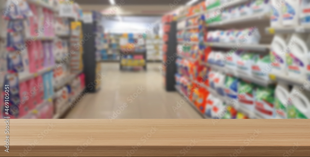 empty wooden floor in front of supermarket background