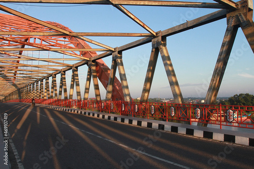 A motorbike ride over Kahayan Bridge in Palangka Raya, Central Kalimantan, Indoneisa. 