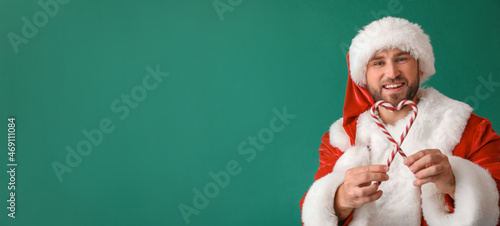 Santa Claus with candy cane...