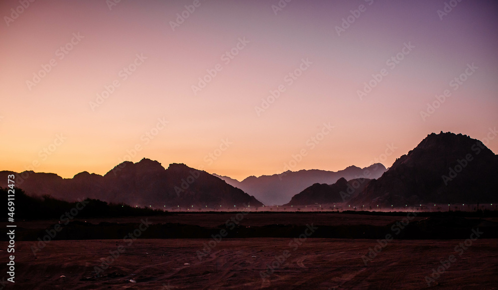 Egyptian desert near the Sinai Mountains at sunset.