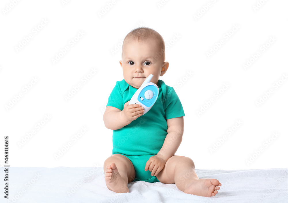Cute little child with baby monitor on white background Cute little child with baby monitor on white background