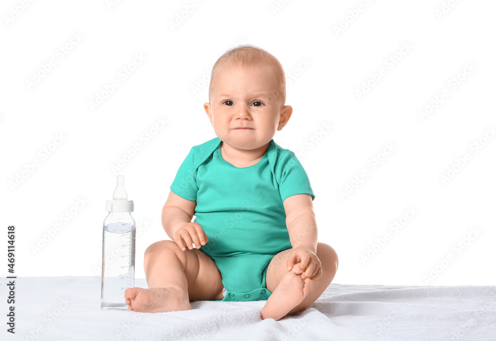 Cute little baby and bottle of water on white background Cute little baby and bottle of water on white background