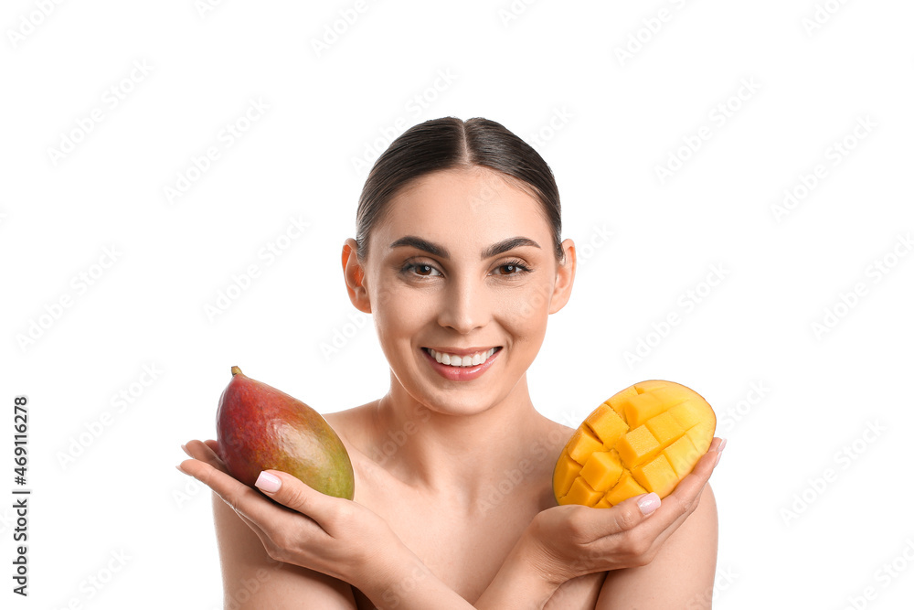 Beautiful smiling woman holding mango on white background Beautiful smiling woman holding mango on white background