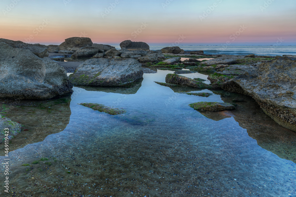 Coast of the Caspian Sea at sunset.