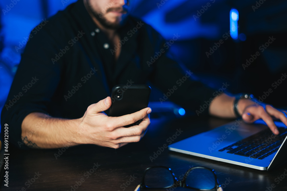 Man pointing on smartphone screen, chatting in social networks, meeting website, searching internet, sending sms, using text messenger or online banking. Remote work