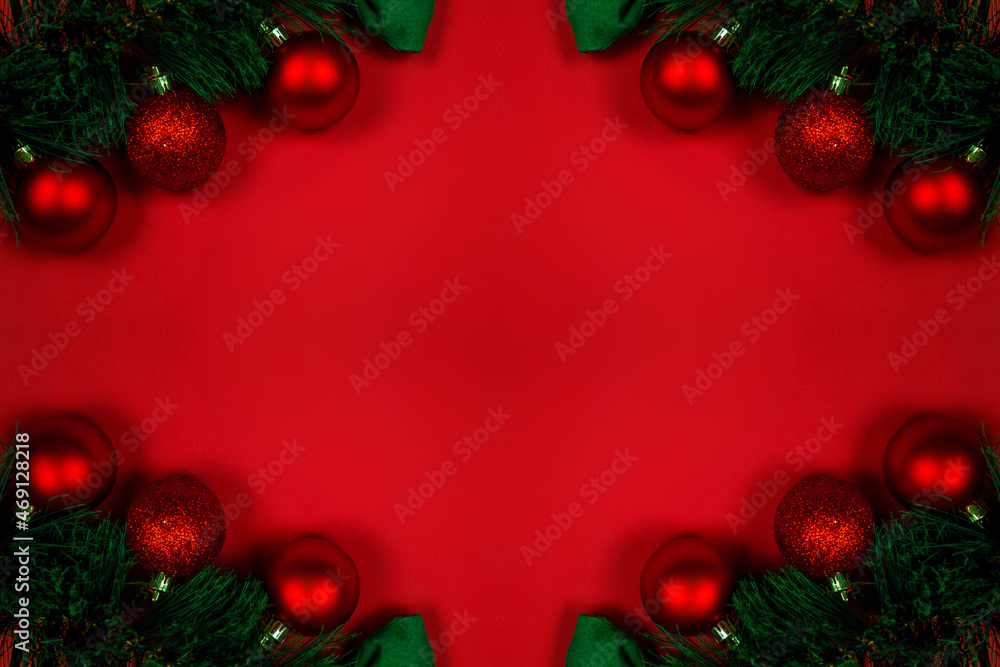 Christmas composition with decorations, fir tree branches on red background. Flat lay, top view, copy space. Minimalistic stylish background for design free space. Christmas composition with decorations, fir tree branches on red background. Flat lay, top view, copy space. Minimalistic stylish background for design free space.