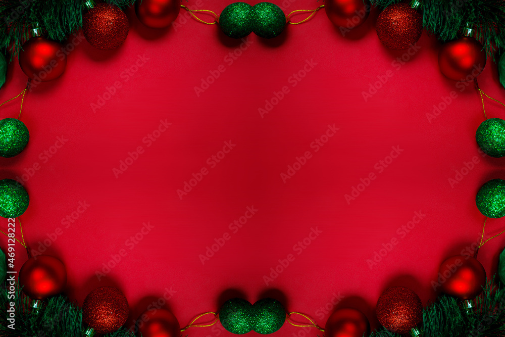 Christmas composition with decorations, fir tree branches on red background. Flat lay, top view, copy space. Minimalistic stylish background for design free space. Christmas composition with decorations, fir tree branches on red background. Flat lay, top view, copy space. Minimalistic stylish background for design free space.