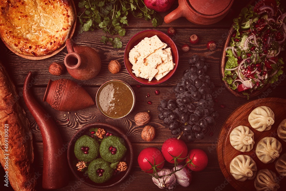 Traditional Georgian table, top view, Khinkali, Phali, Shoti, Khachapuri, Sauces, Fruits, nuts, Salad, cheese, horizontal, no people, Traditional Georgian table, top view, Khinkali, Phali, Shoti, Khachapuri, Sauces, Fruits, nuts, Salad, cheese, horizontal, no people,