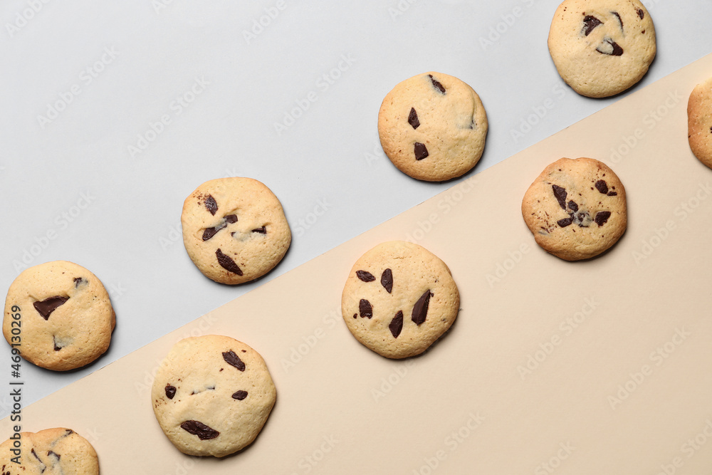 Delicious cookies with chocolate chips on color background Delicious cookies with chocolate chips on color background