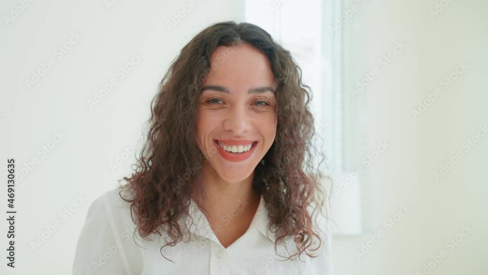Portrait of Latino Beautiful girl in pajamas smile and look at camera.
Portrait of Latino Beautiful girl in pajamas smile and look at camera.