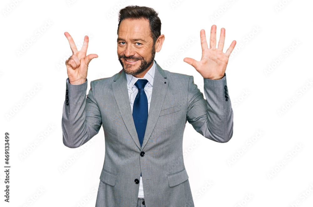 Middle age man wearing business clothes showing and pointing up with fingers number eight while smiling confident and happy. Middle age man wearing business clothes showing and pointing up with fingers number eight while smiling confident and happy.