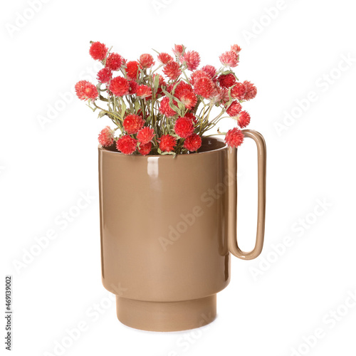 Stylish ceramic vase with wild flowers bouquet on white background