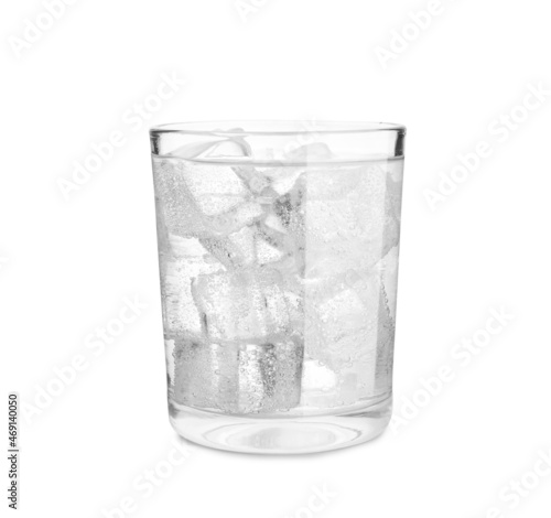 Glass of soda water with ice isolated on white