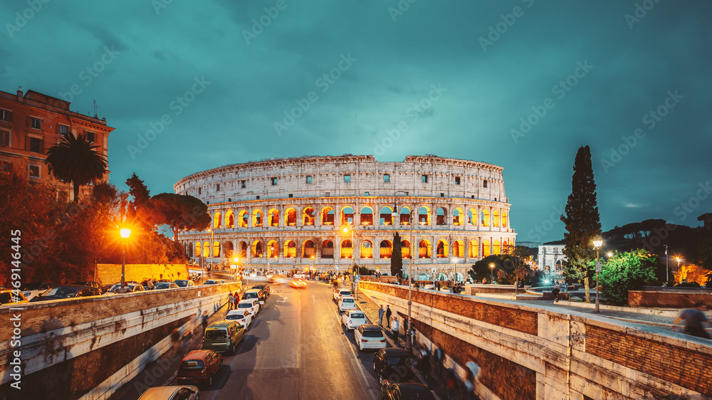 Rome, Italy. Colosseum Also Known As Flavian Amphitheatre In Evening Or Night Time