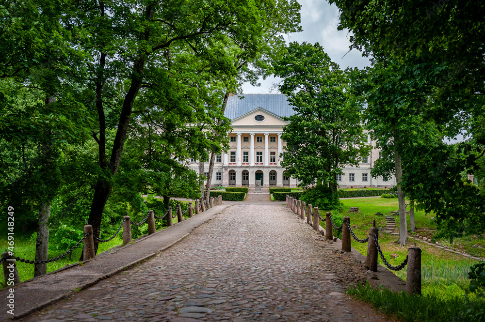 View to Kazdanga Palace built in the late classical style. The stone bridge, leading to the palace. Latvia. Baltic.