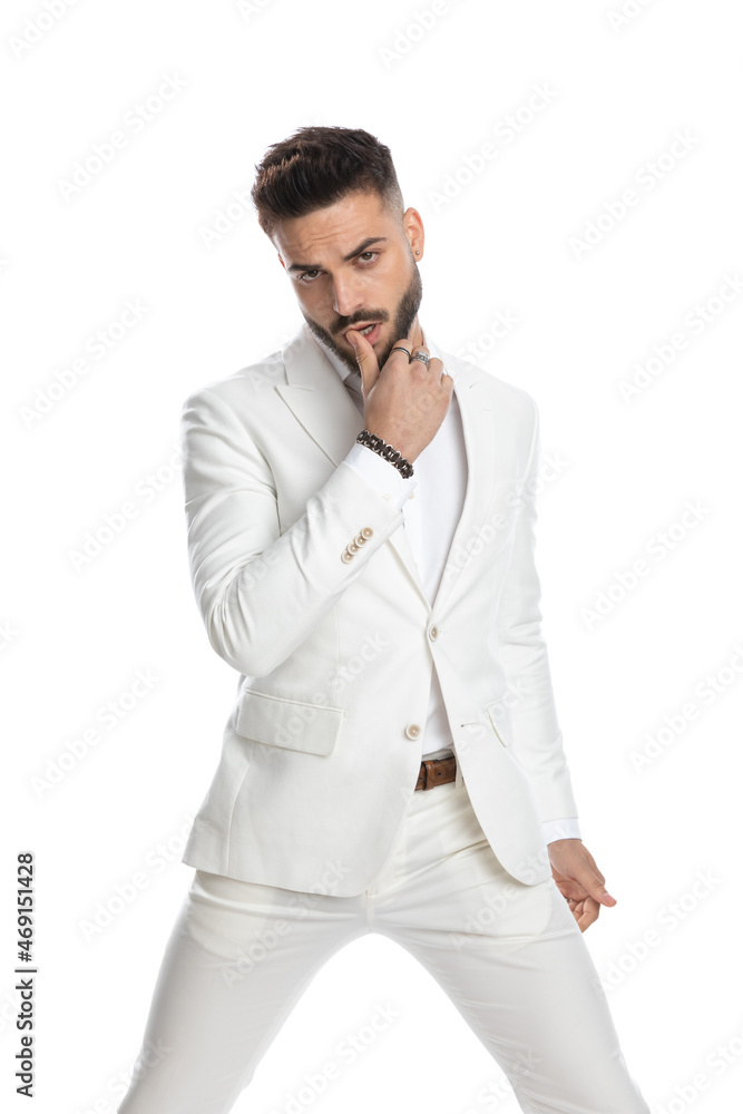 sexy businessman touching his lips and being sensual sexy businessman touching his lips and being sensual