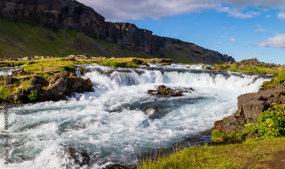 waterfall in the mountains, Iceland