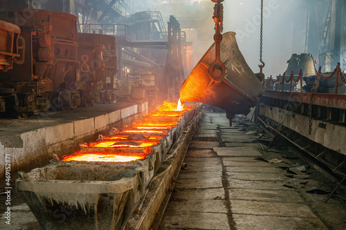 Copper ore processing. Pouring hot metal at the factory. Foundry.