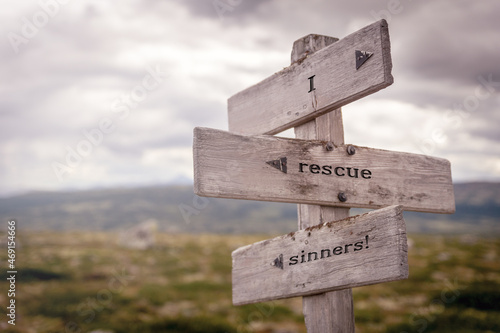 Fototapeta i rescue sinners text on wooden sign outdoors in nature