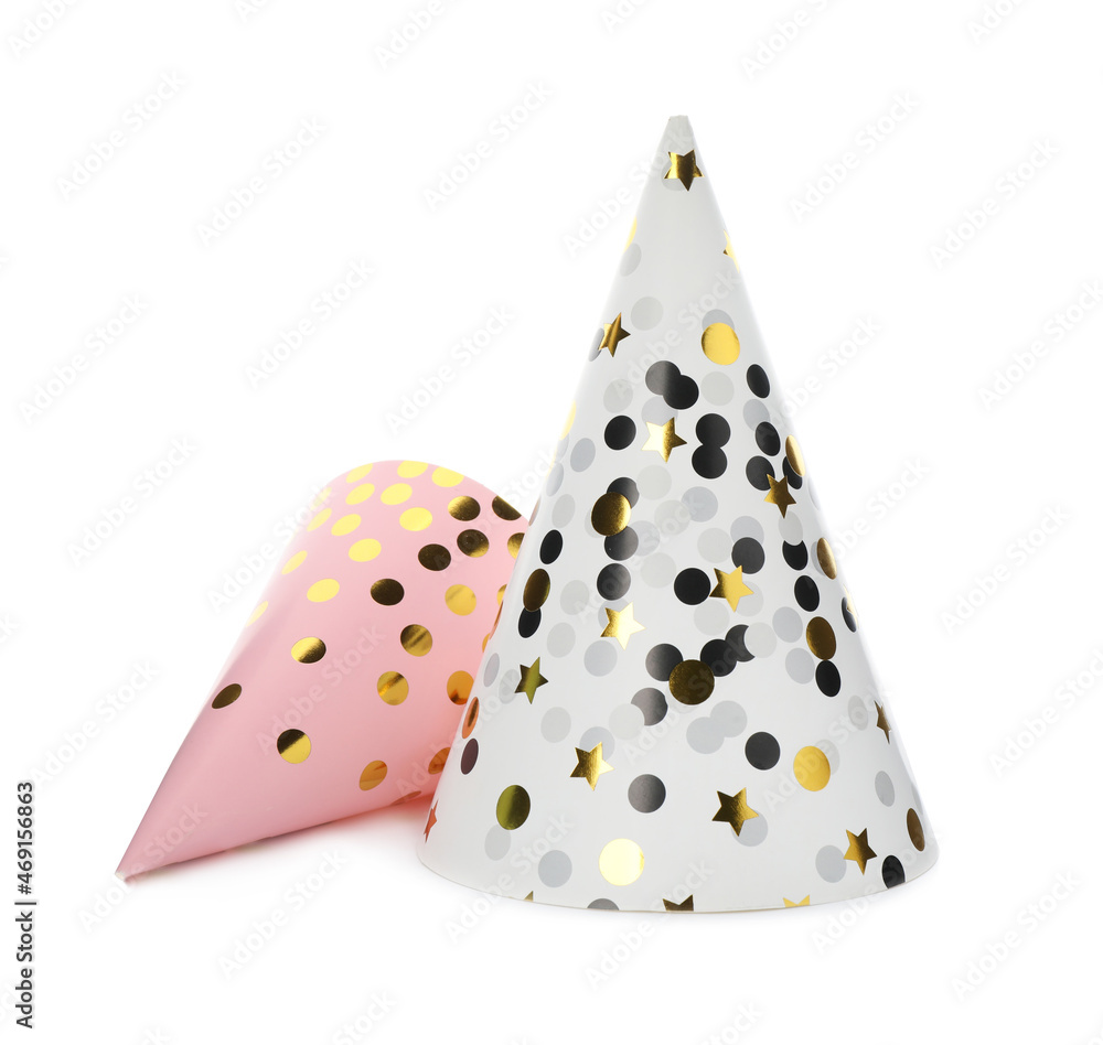 Bright party hats on white background. Festive accessory Bright party hats on white background. Festive accessory