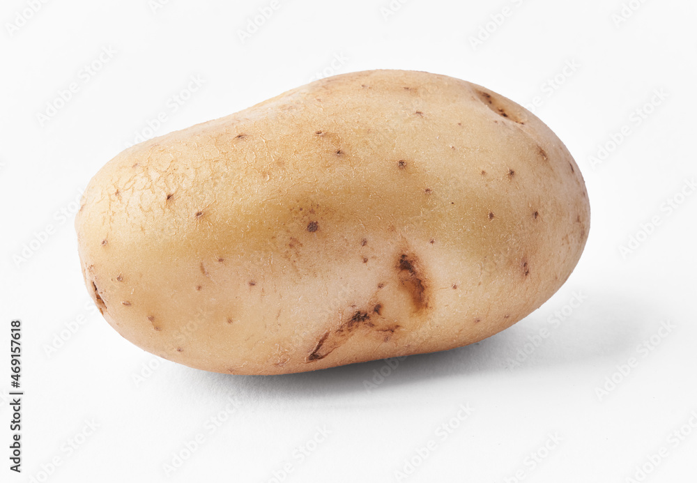  SIngle potato isolated on a white background