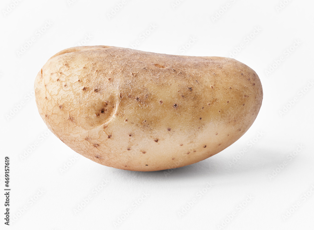 SIngle potato isolated on a white background SIngle potato isolated on a white background