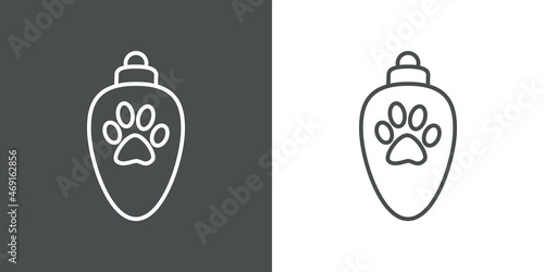 Decoración para árbol de navidad. Icono silueta de bola de navidad ovalada con pisada de gato o perro con líneas en fondo gris y fondo blanco