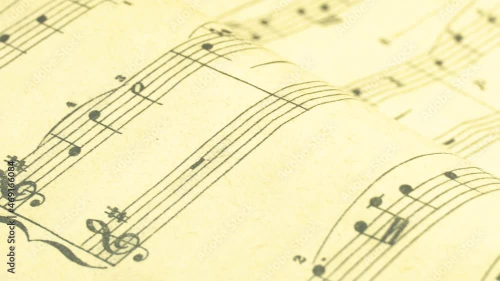 Atmospheric music background with notes on old paper in black and white.Ukraine, November 14, 2021 Atmospheric music background with notes on old paper in black and white.Ukraine, November 14, 2021